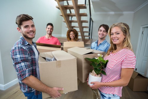 Hammersmith Movers team using protective equipment during a careful home move