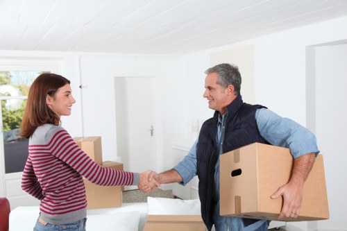 Loading household items into a van near Hammersmith