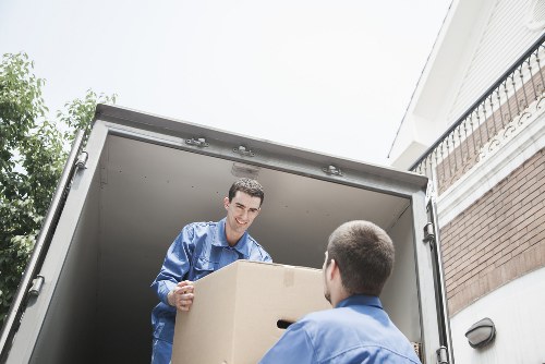 Loading furniture into a removal truck in West London