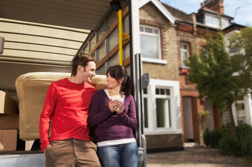 Professional movers loading items carefully as part of a safe moving process