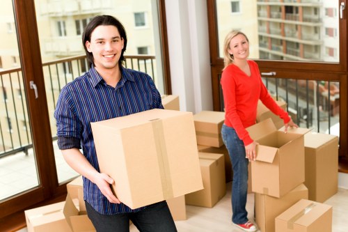 Local removals team handling furniture move in Hammersmith flat