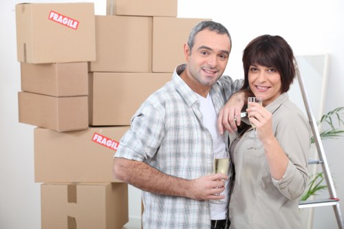 Moving team transporting office items in West London