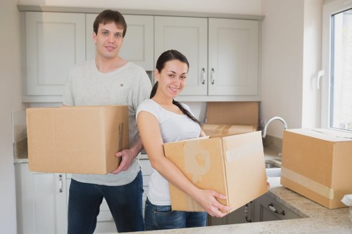Office removals team moving desks and equipment in Hammersmith